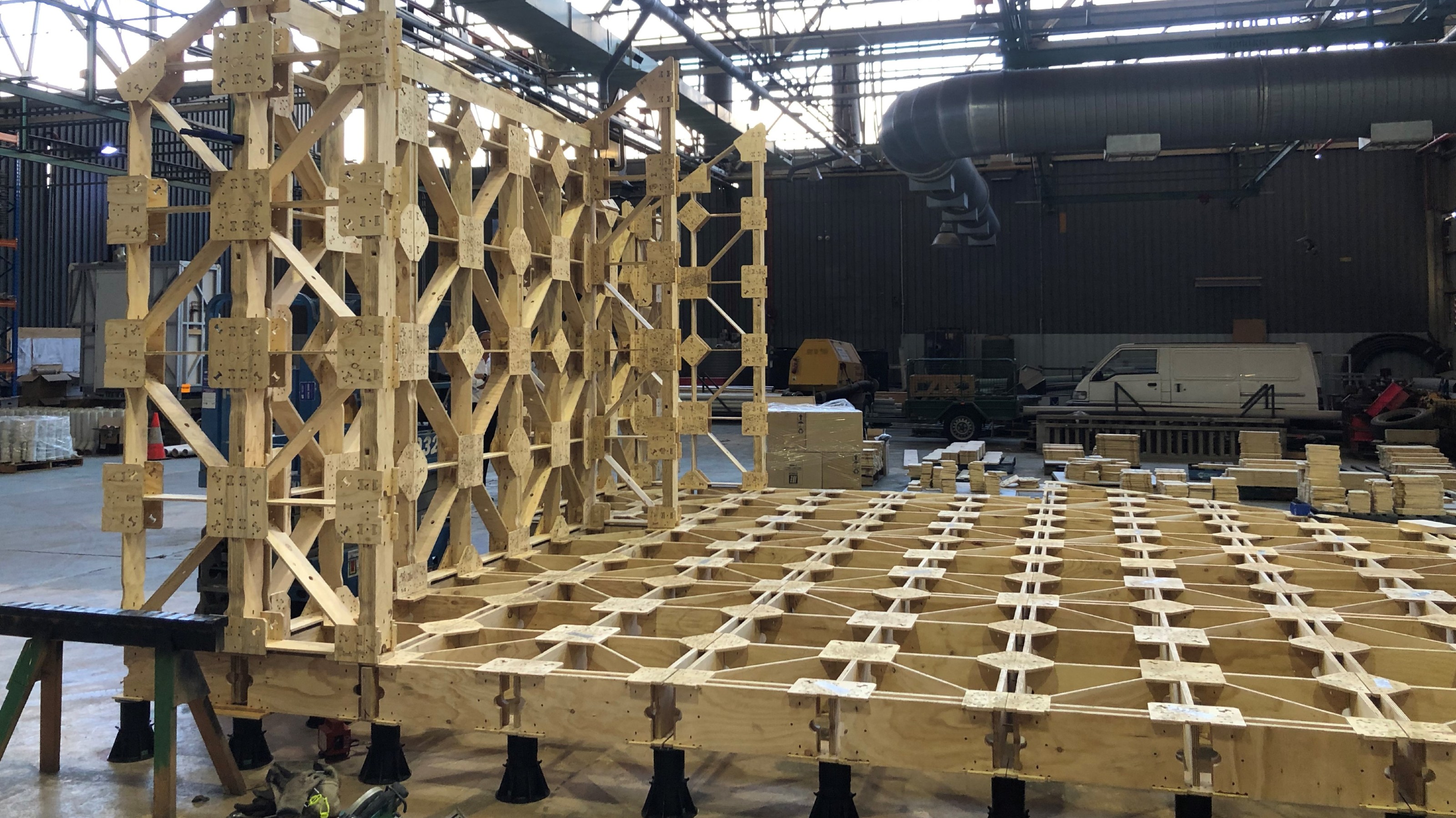 Ged Finch's X-frame a wooden zero waste building solution being assembled