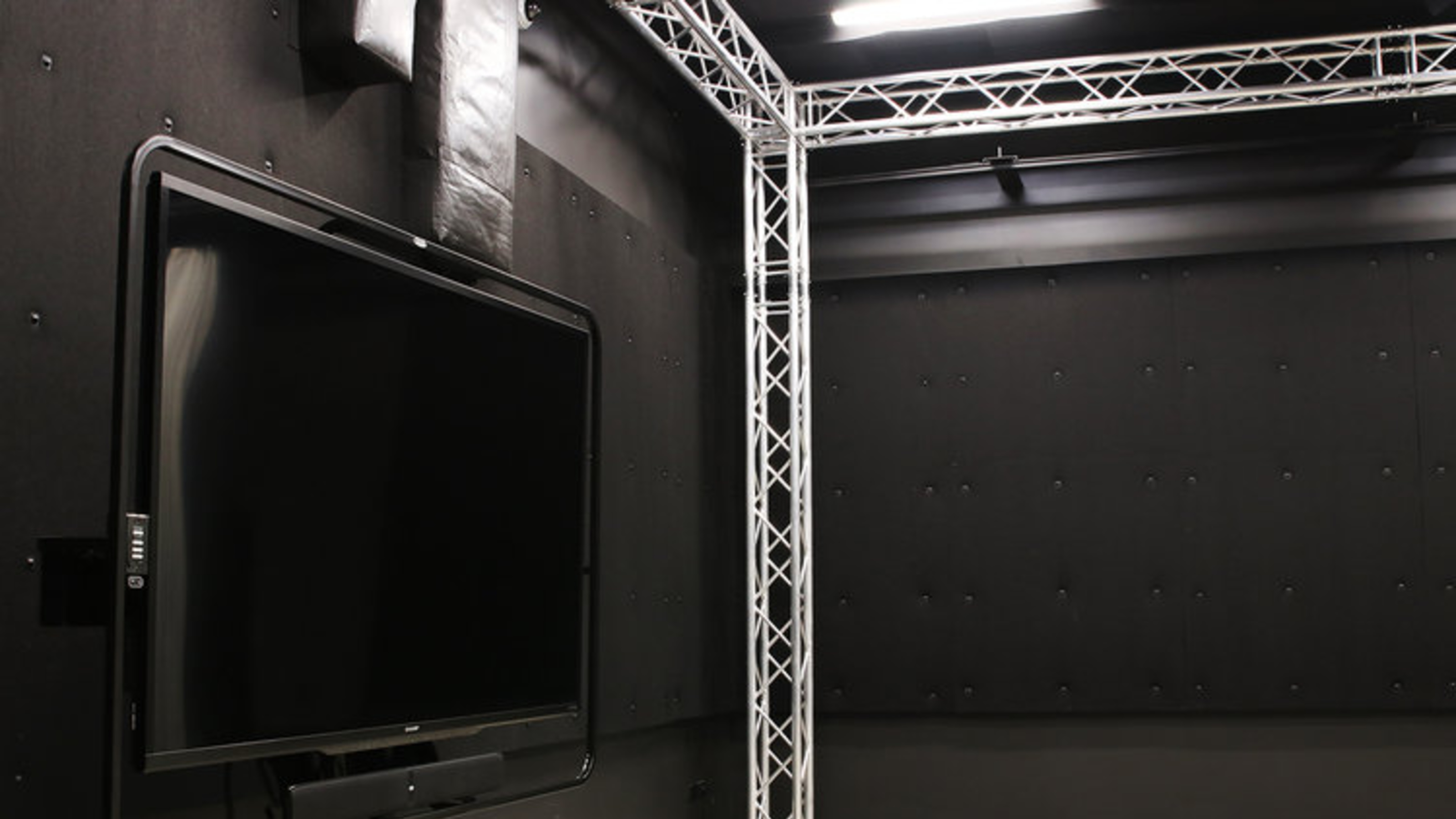 Film studio, view of TV screen and lightning grid.