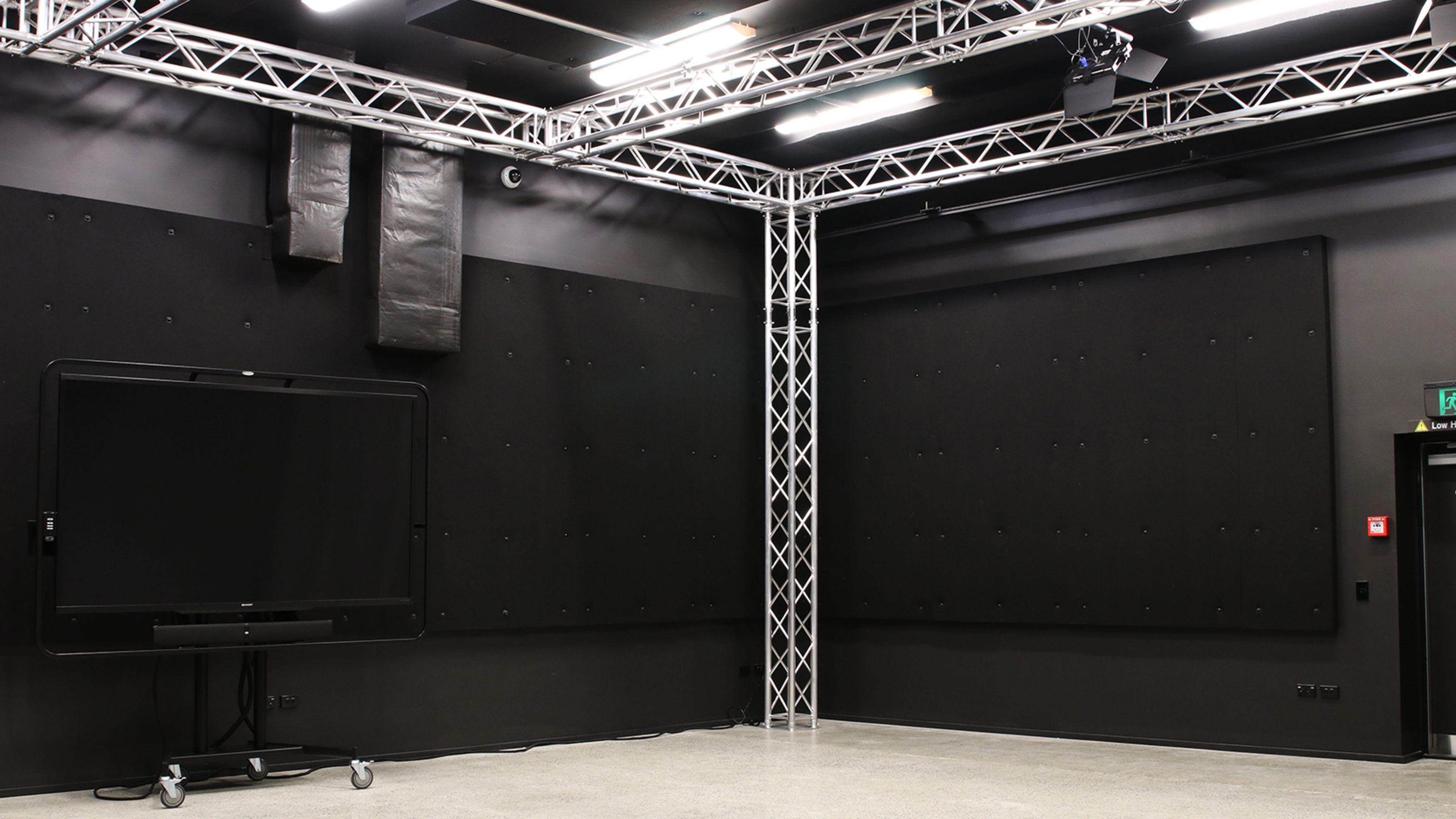 Film studio, view of TV screen and lightning grid.