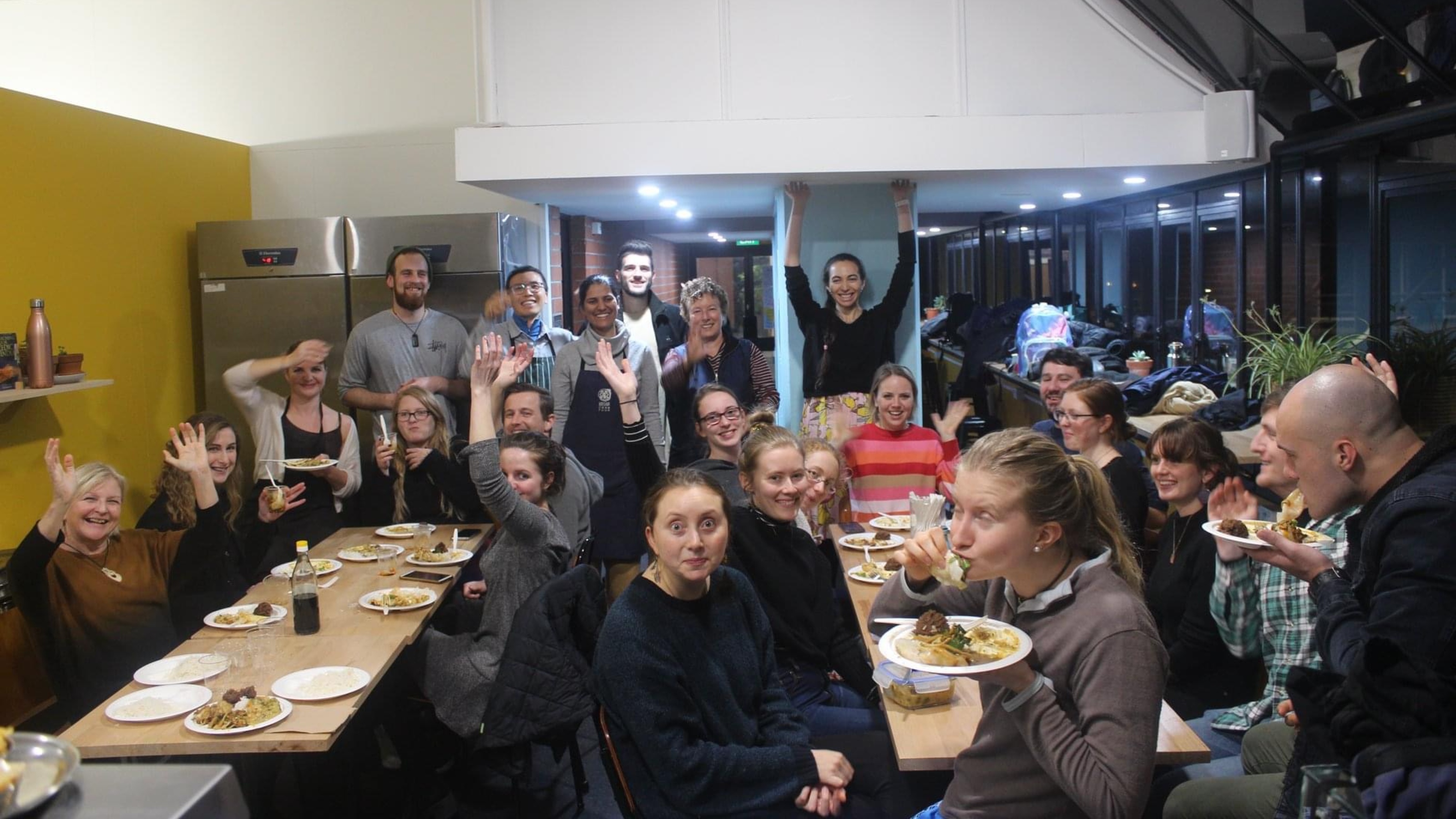 Students sharing meal in Bhakti lounge.