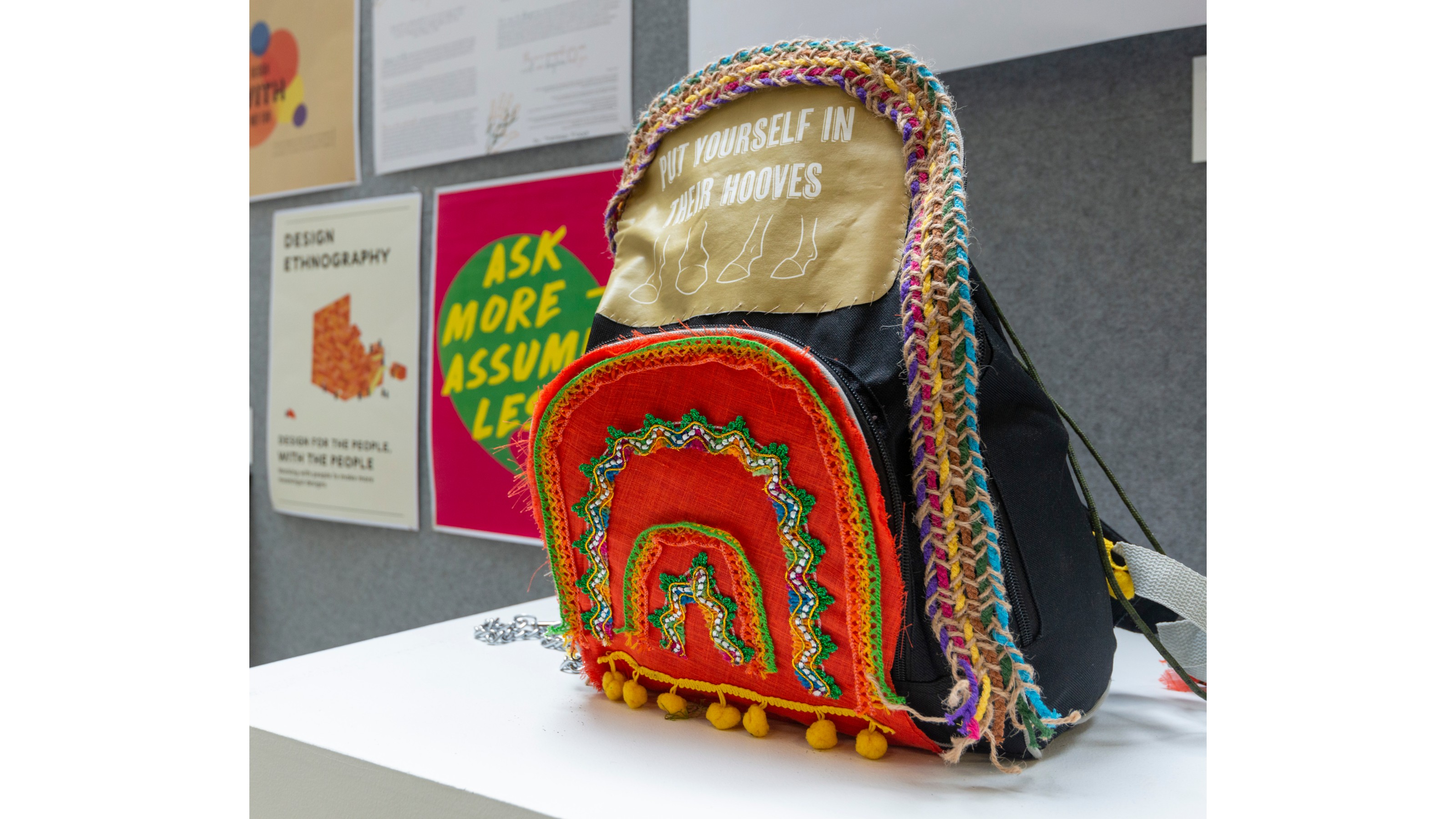 Colourful embroidered backpack from RNDR19 end of year exhibition