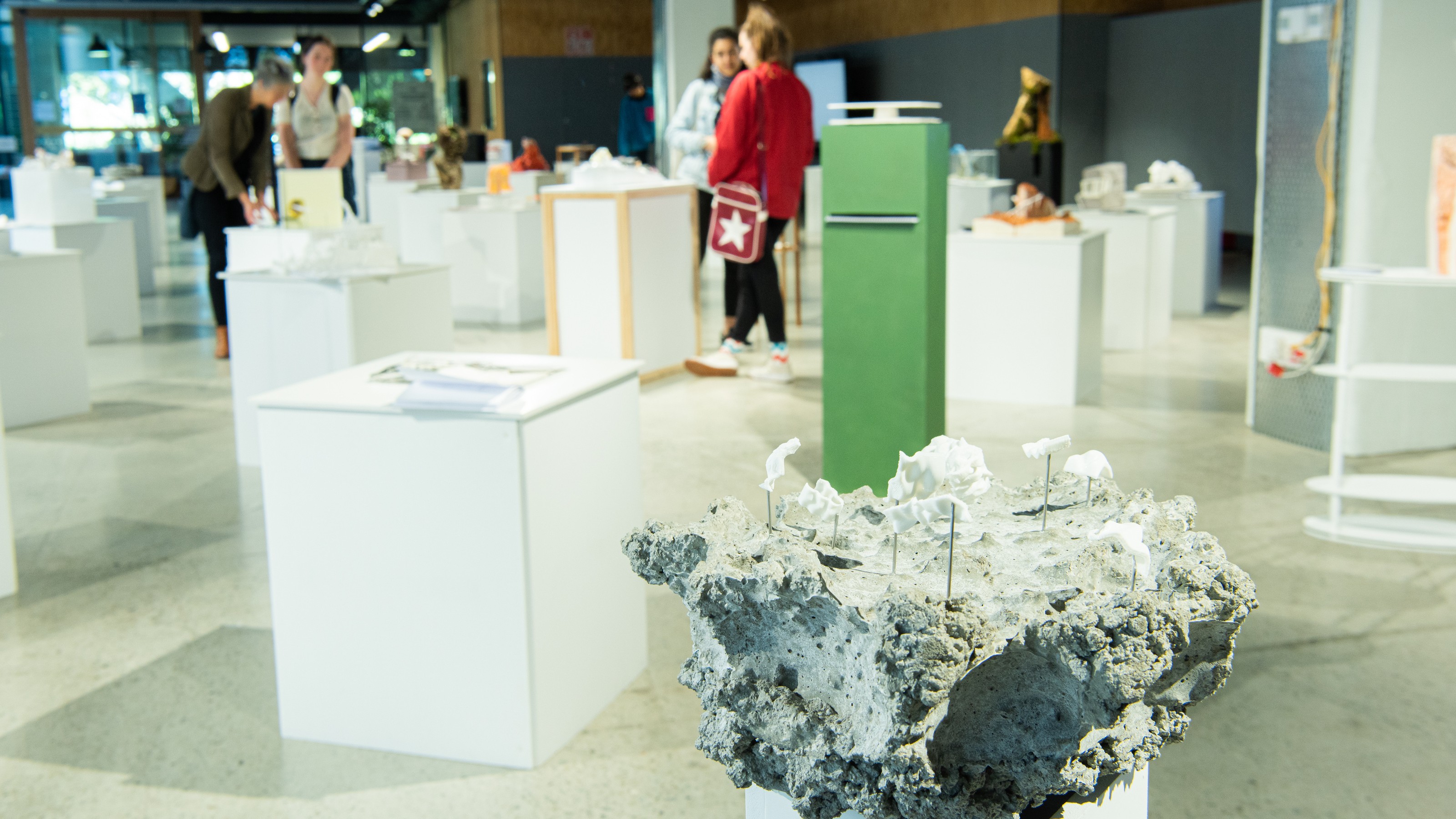 Concrete conceptual pavilion model on display at Collective properties exhibition by SARC 261 elective students