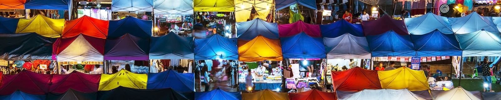 rows of multicoloured canvas tent shops