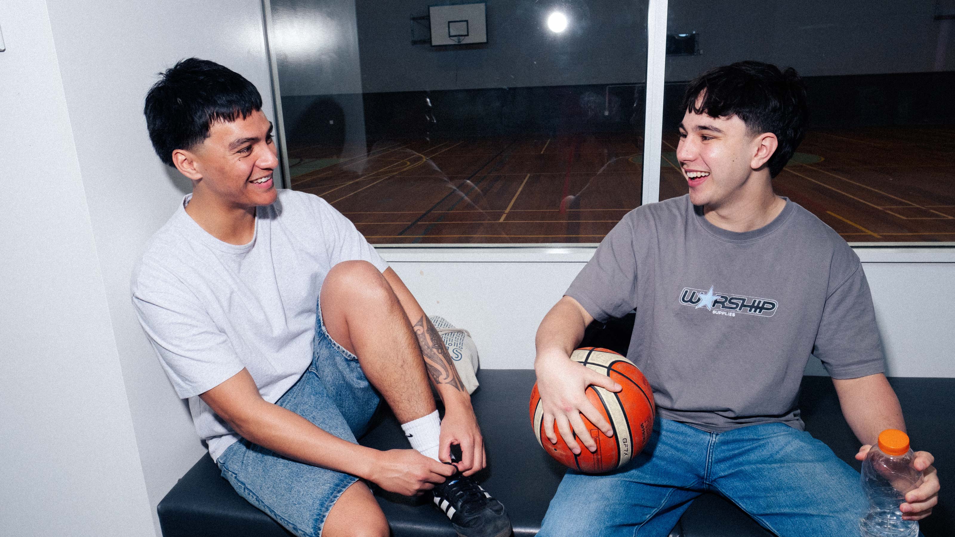 Two students holding a basketball