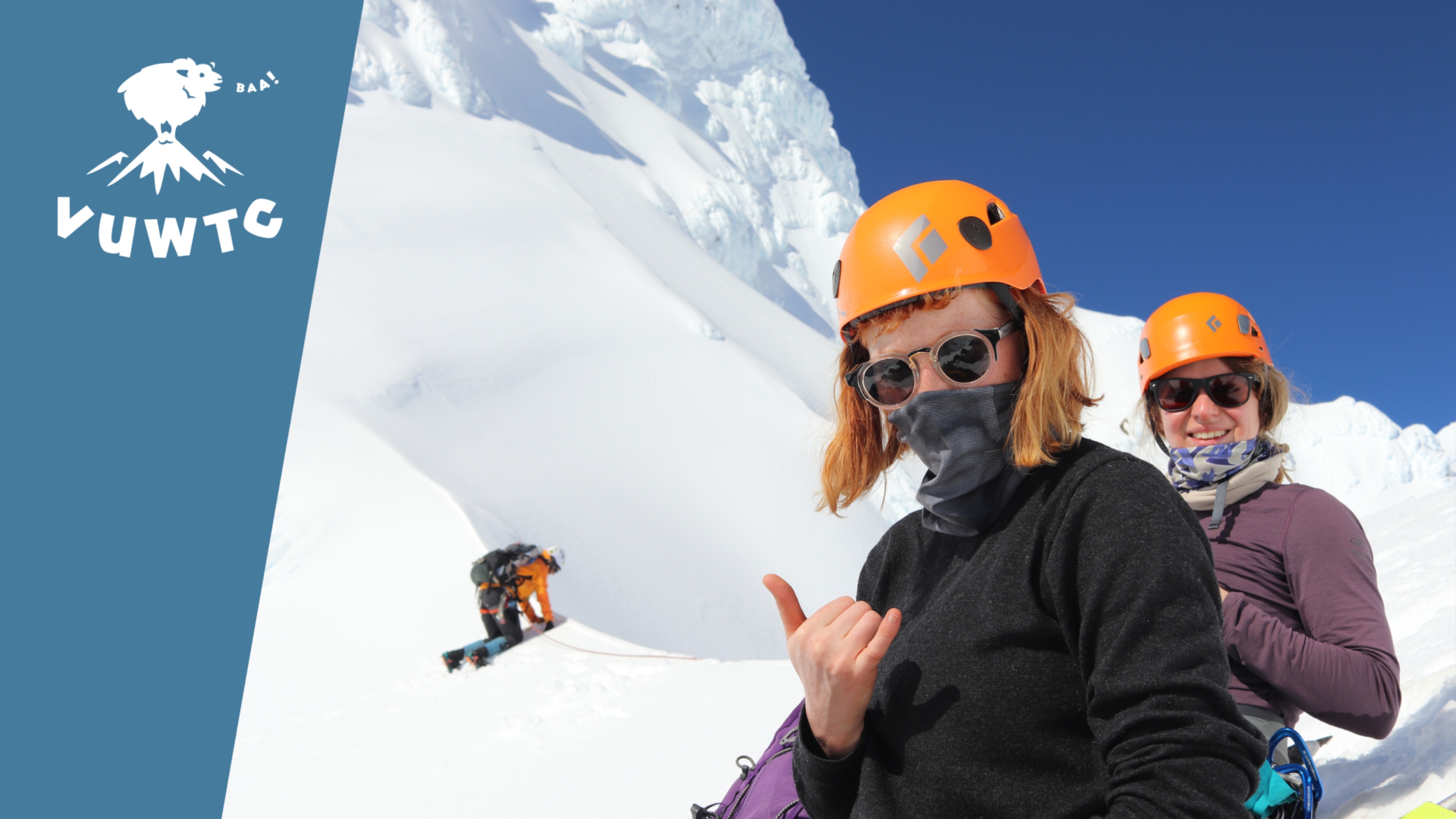 Trampers on snowy mountains, wearing helmets and sunglasses.