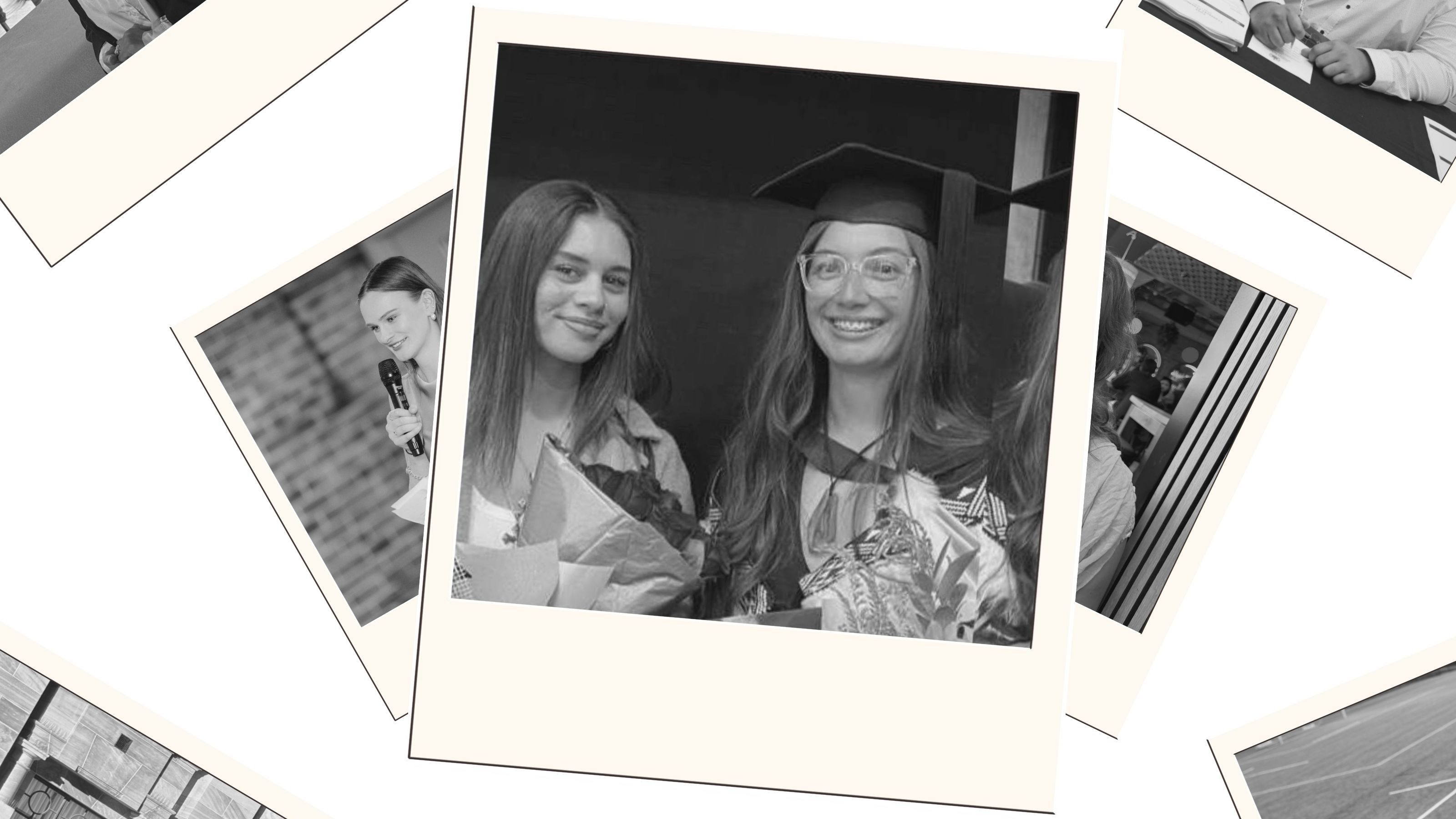 Black and white polaroid photo of a two smiling women, one wearing academic dress..