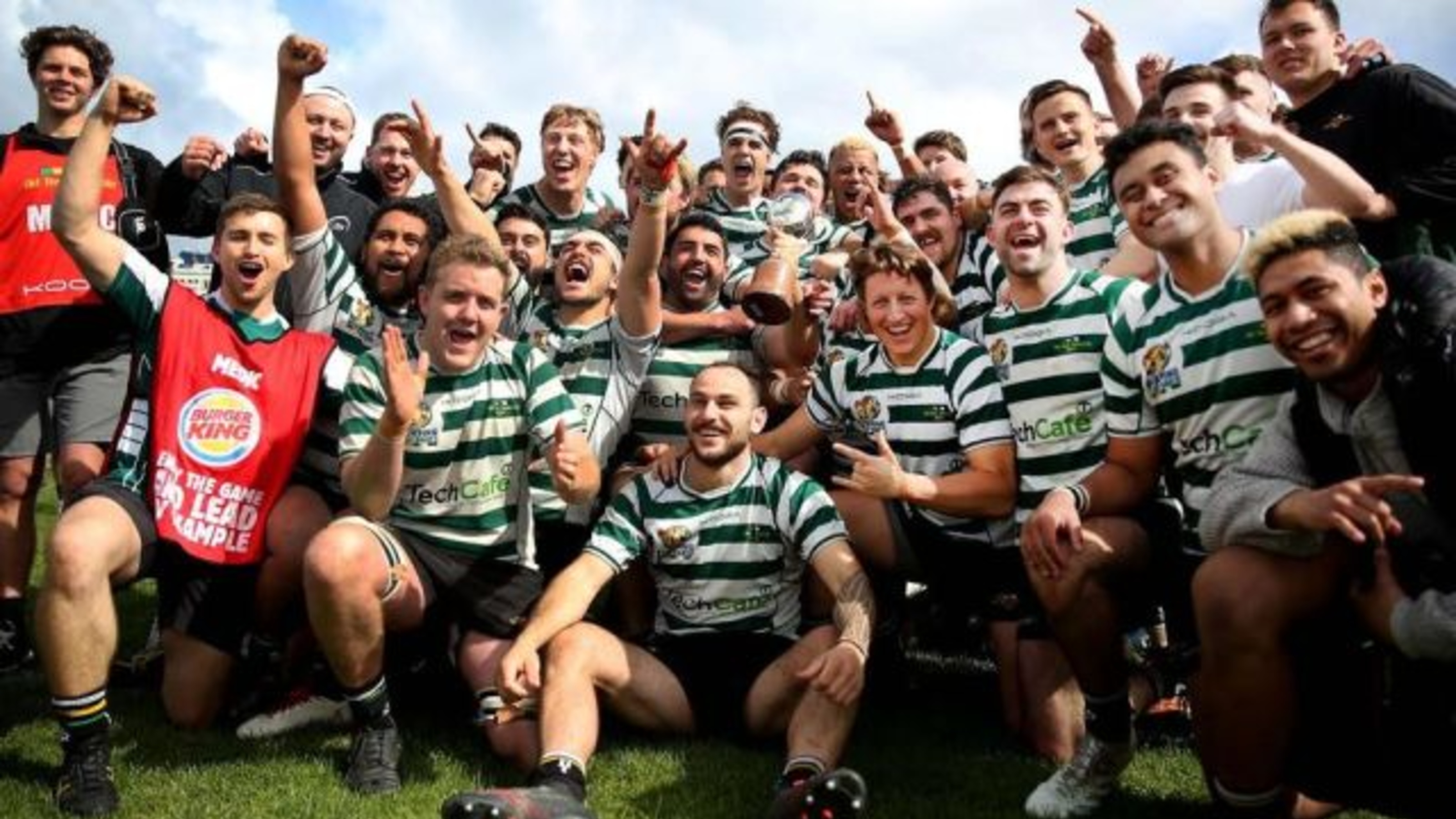 Team picture of OBU players, in rugby gear and jerseys.