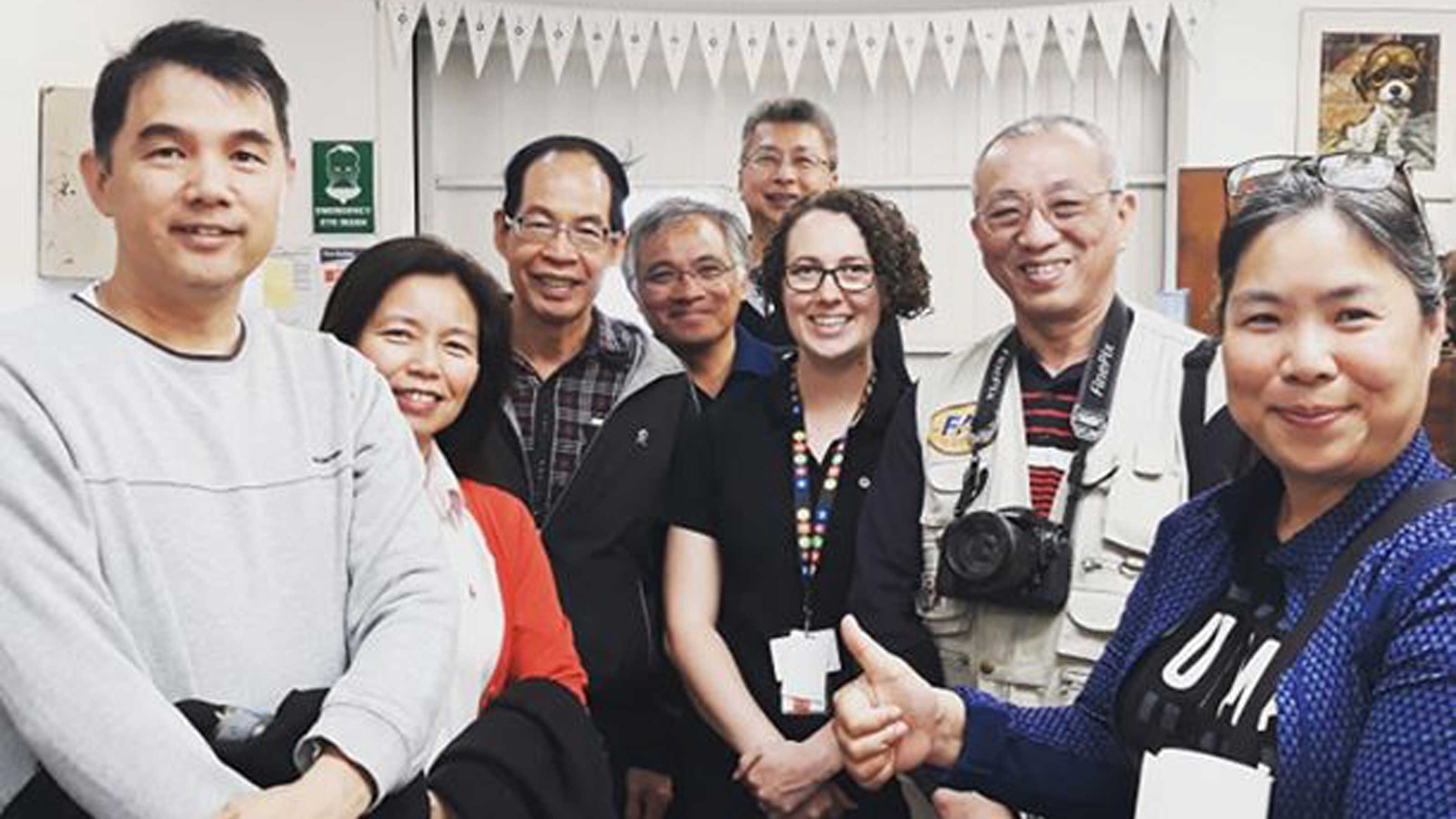 wtap-delegates-visit-motat.jpg Seven Taiwanese visitors with Makyla Curtis at MOTAT print shop