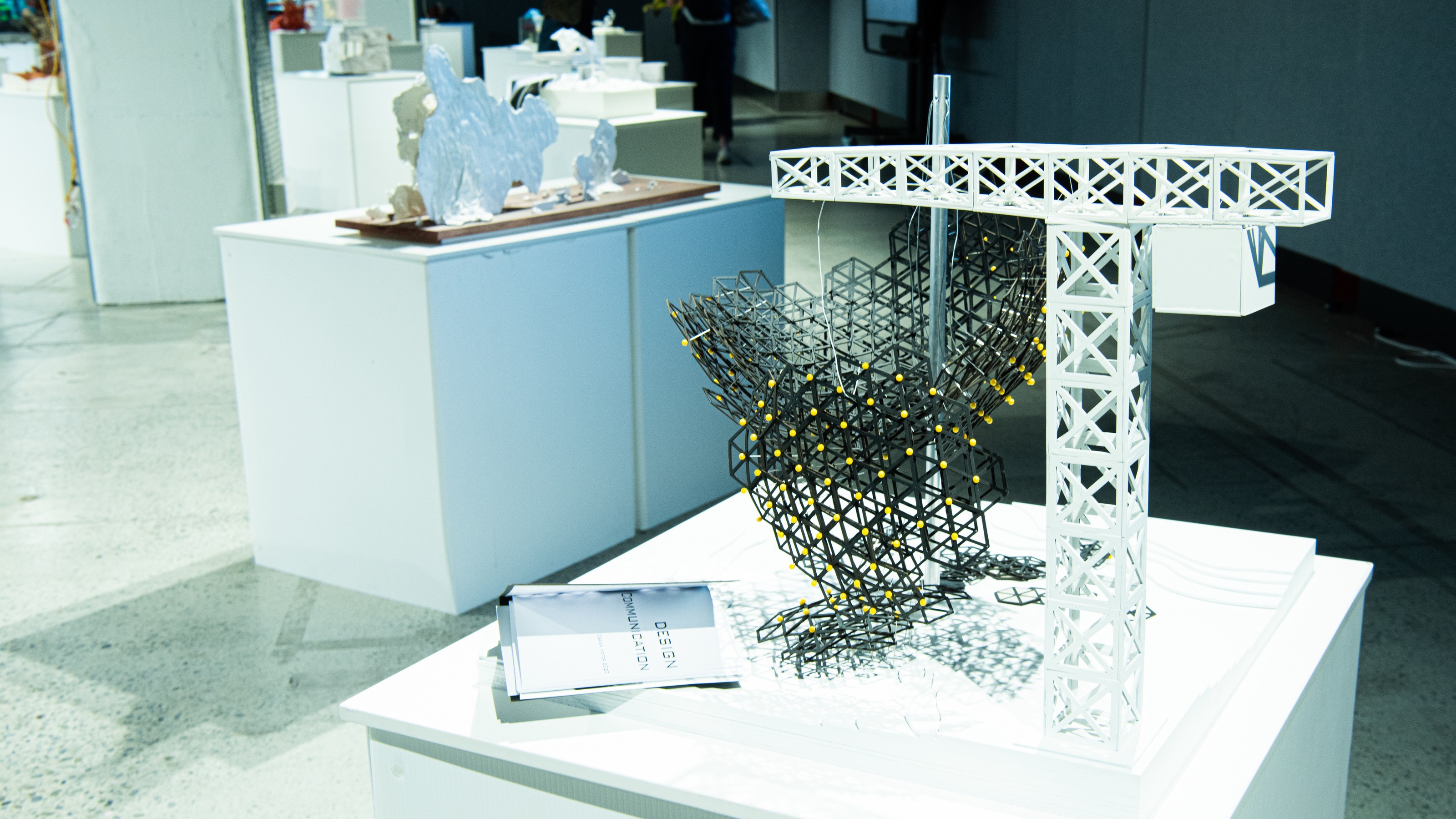 Crane model on display at Collective properties exhibition by SARC 261 elective students