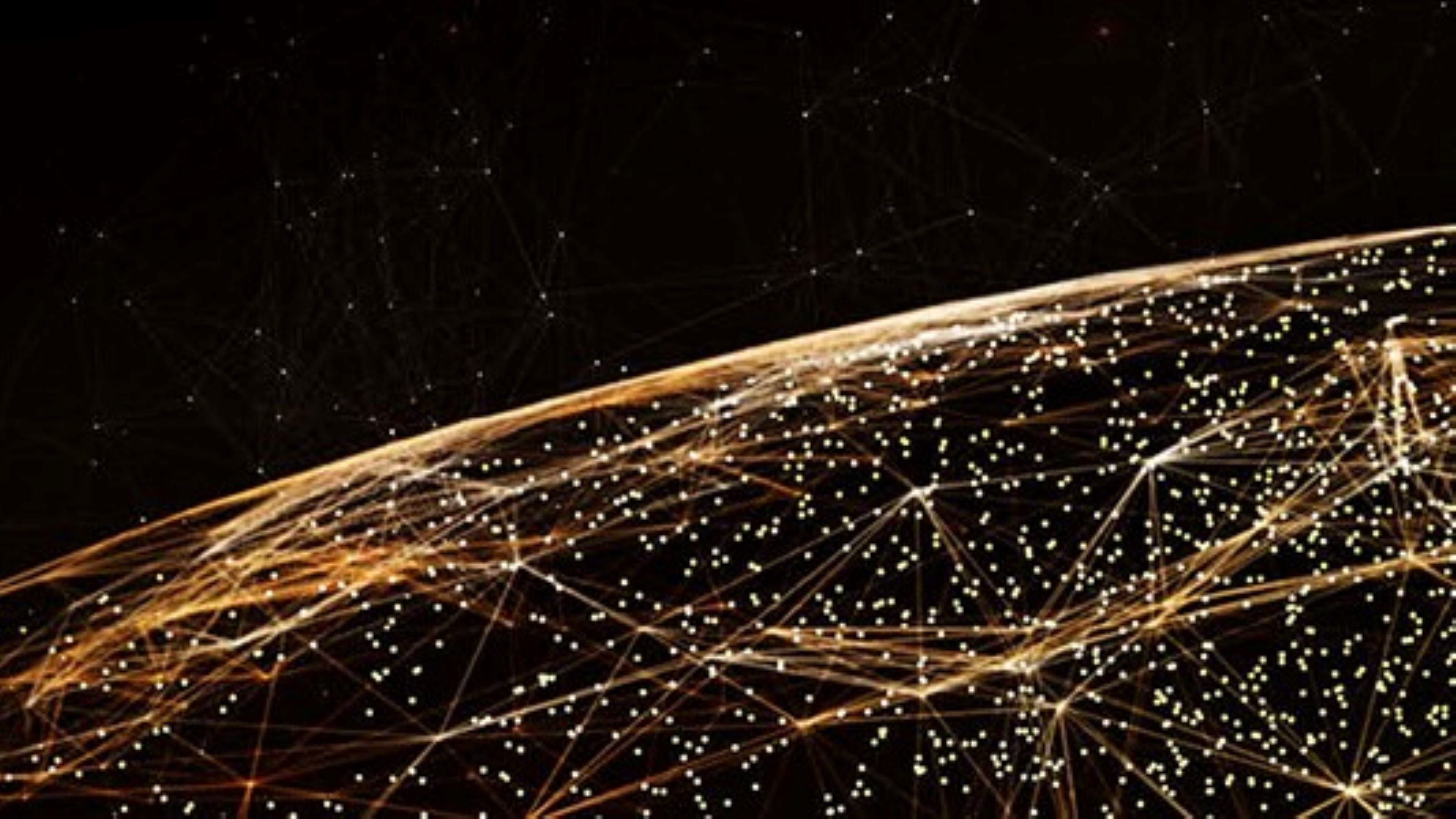 The surface of earth at night with an image of light with orange lines connecting different nodes.