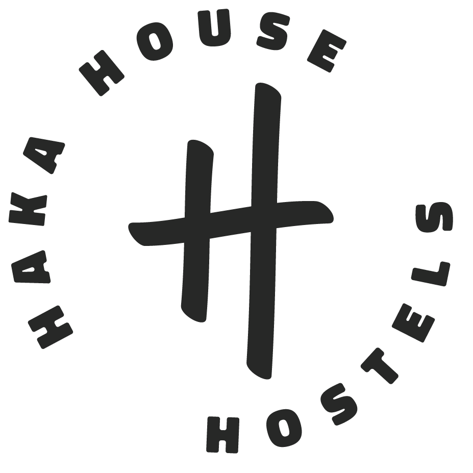 This is a circular logo with the words ‘Haka House Hostels’ arranged around a bold, stylised letter ‘H’ formed by three intersecting brushstroke-like lines.