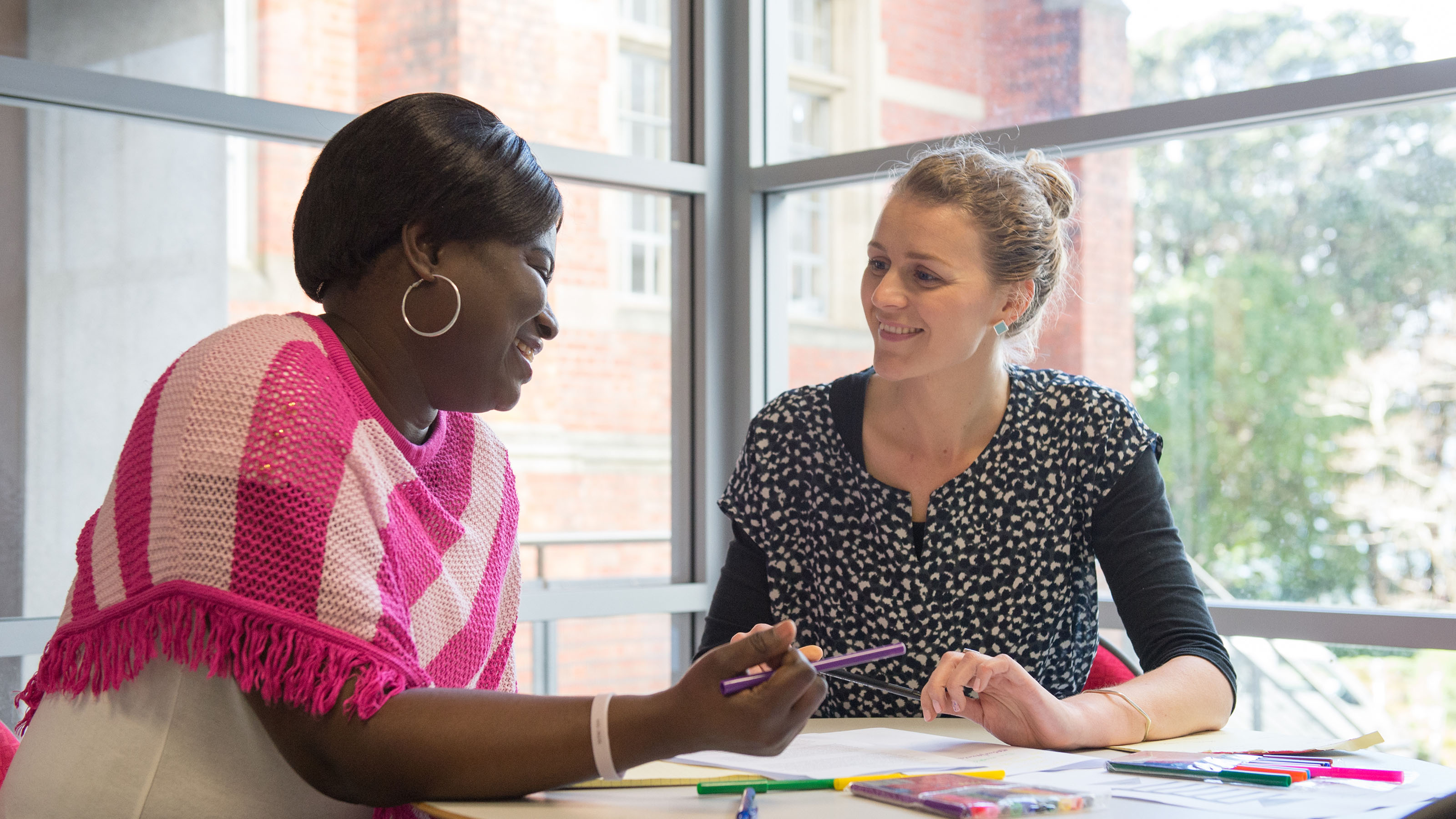 A learning adviser working with a student.