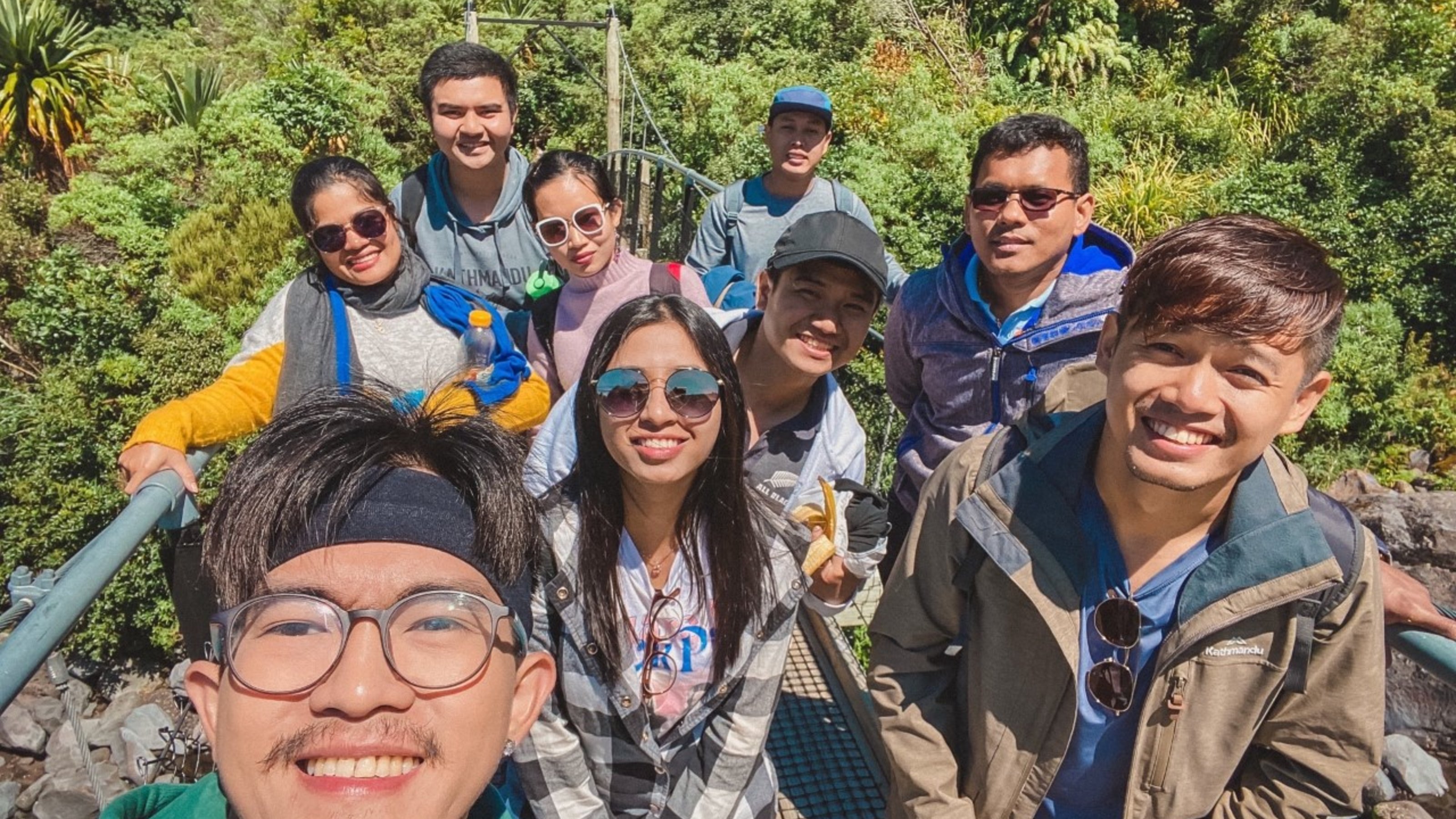 Group picture on swing bridge during tramp.