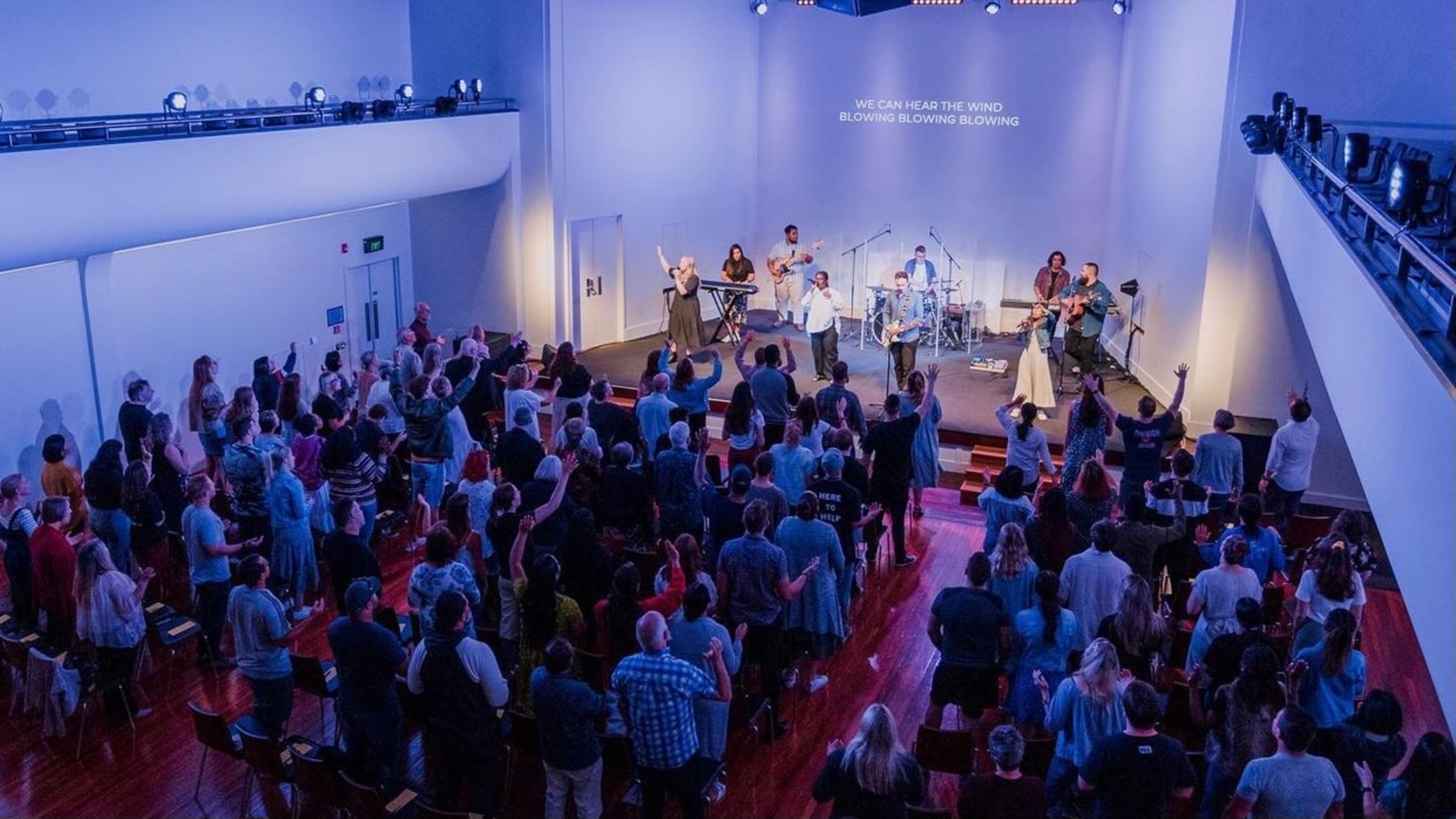 Church members singing during worship.