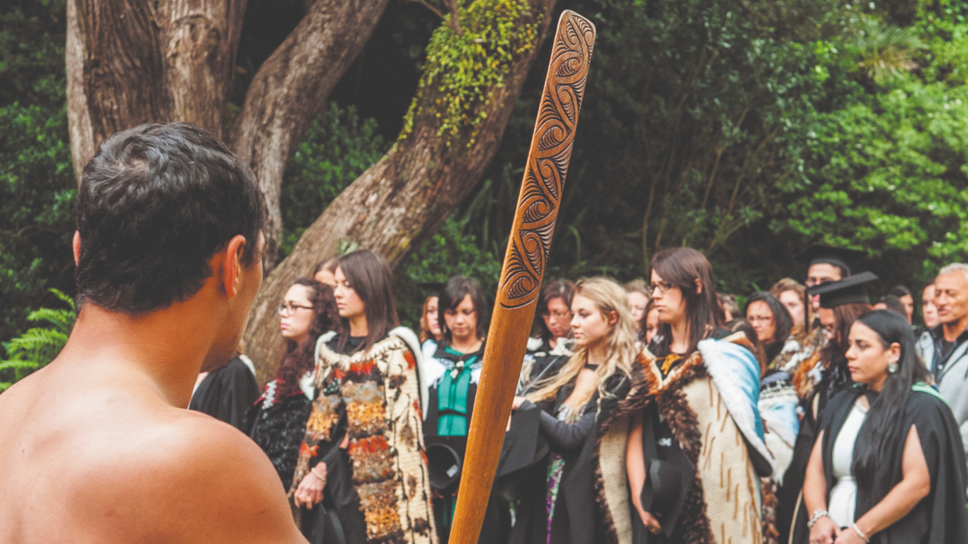 Students attending a graduation ceremony at Te Herenga Waka—Victoria University of Wellington's marae.