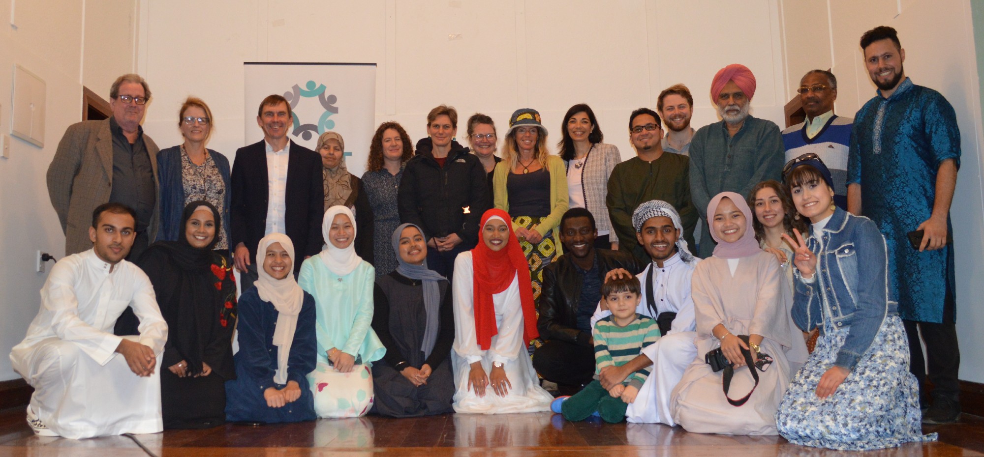 Group of refugee background student club members at the Grand Iftar event,