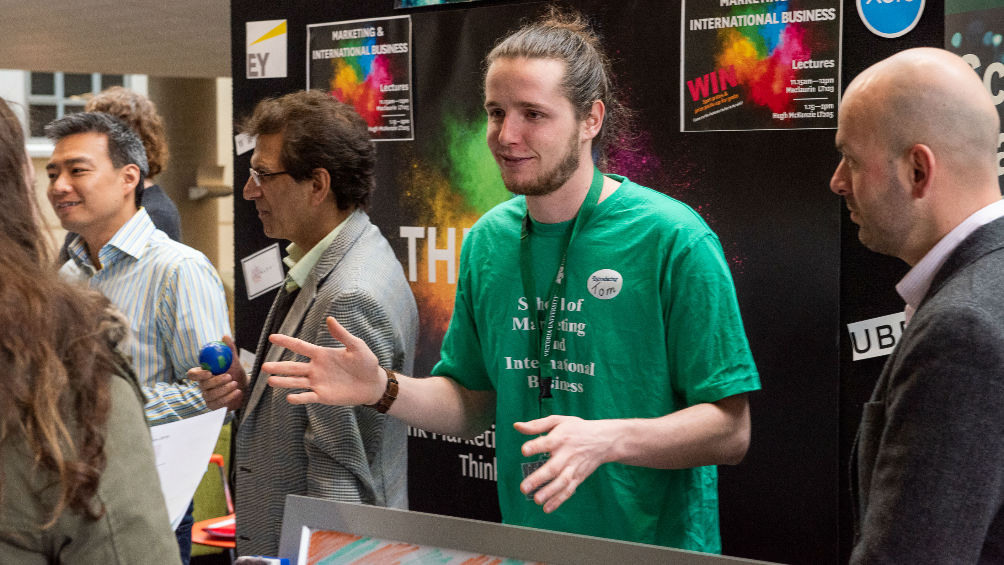 Academics at a booth on open day.
