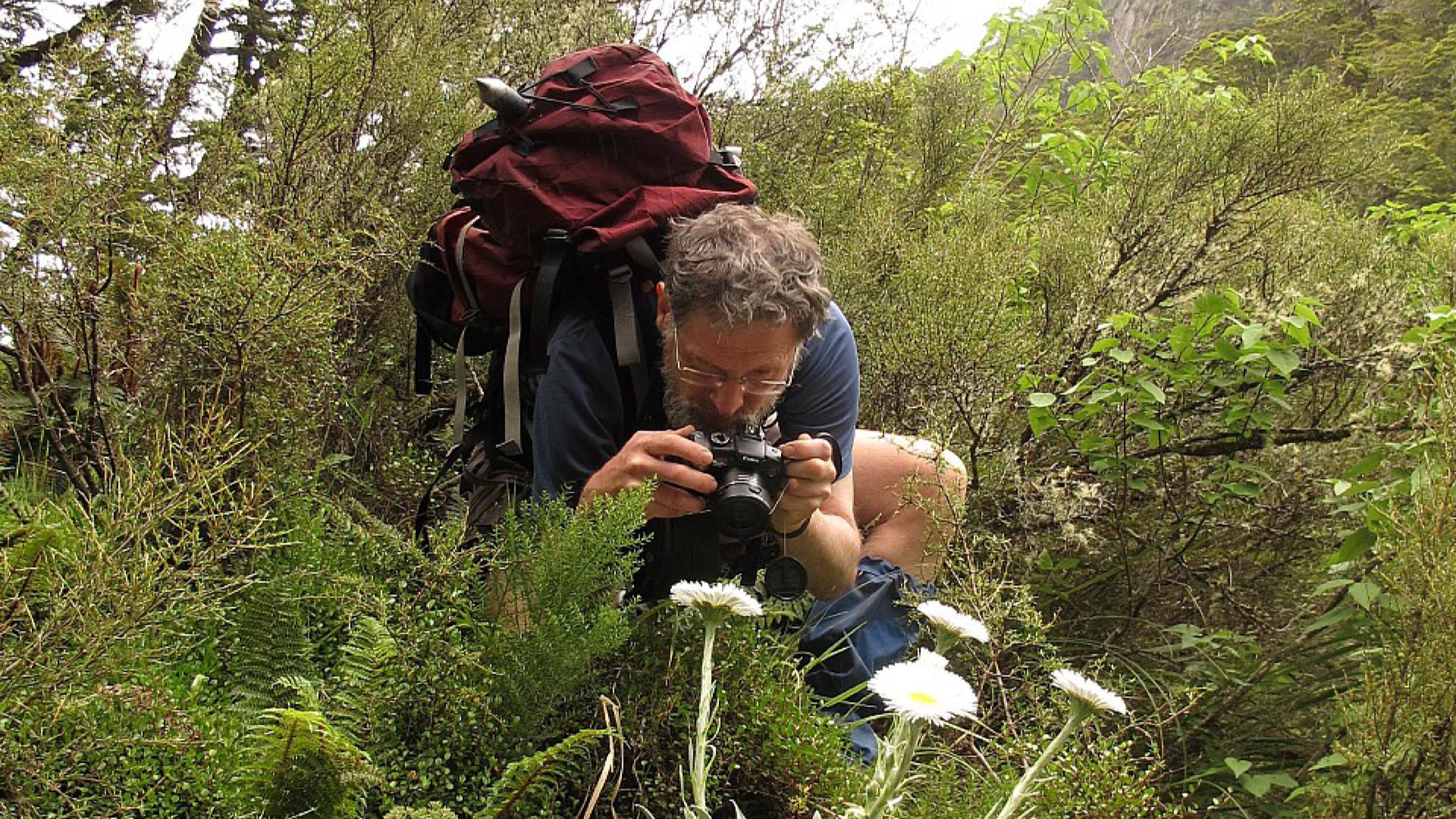 Michael in the bush taking photographs