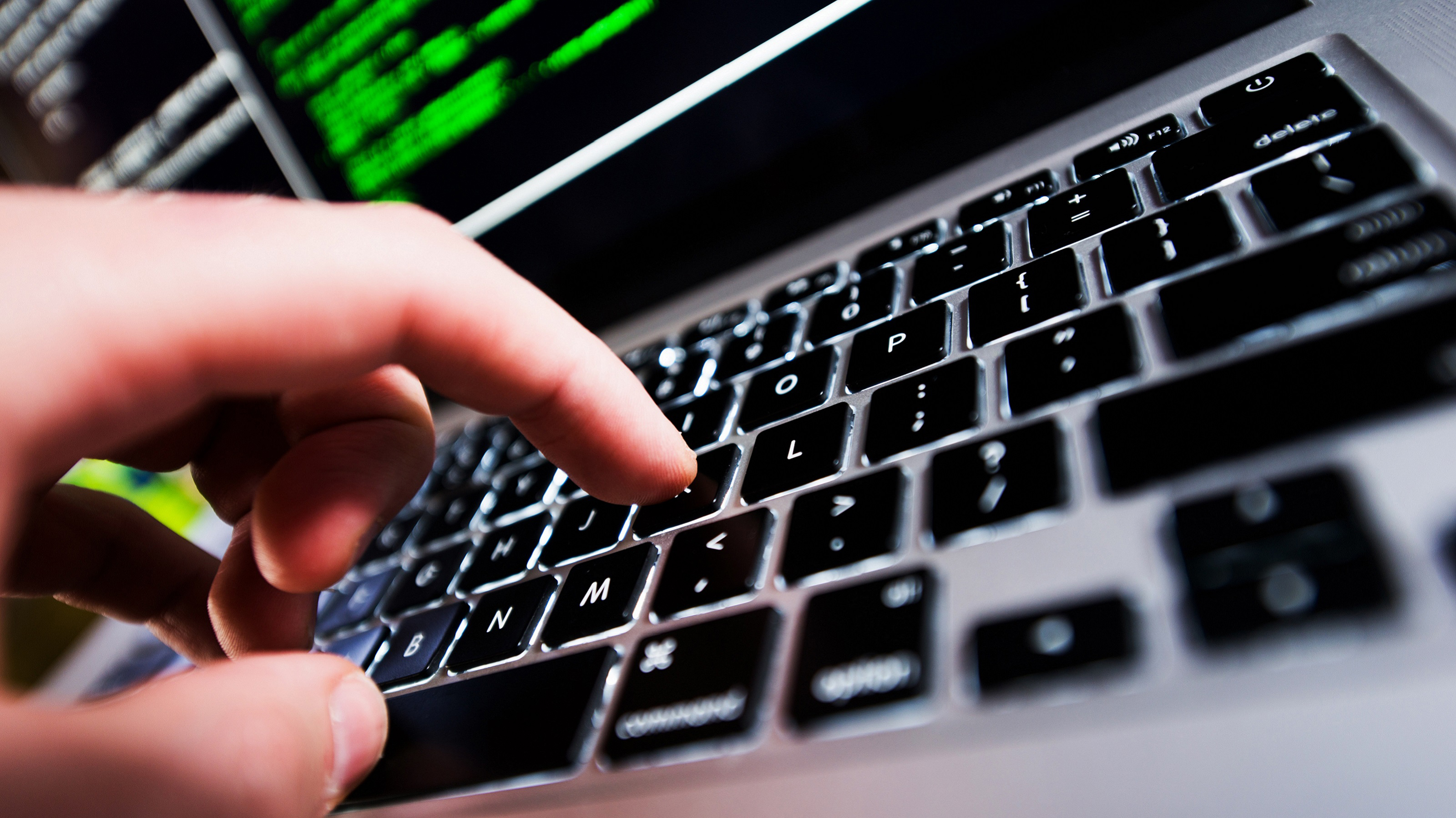 Image of a fingers typing on a keybord.