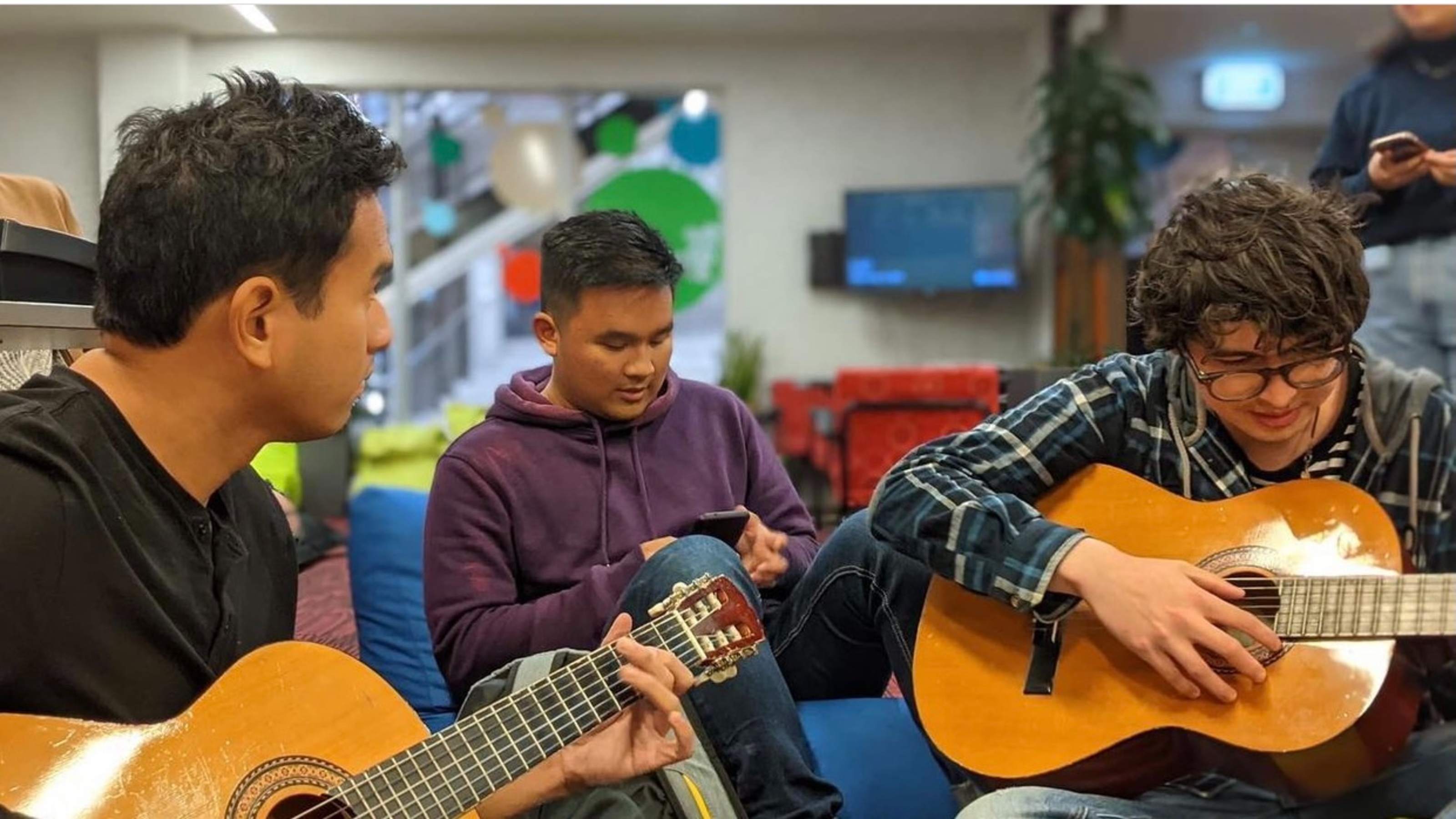Students from Buklod playing instruments together.