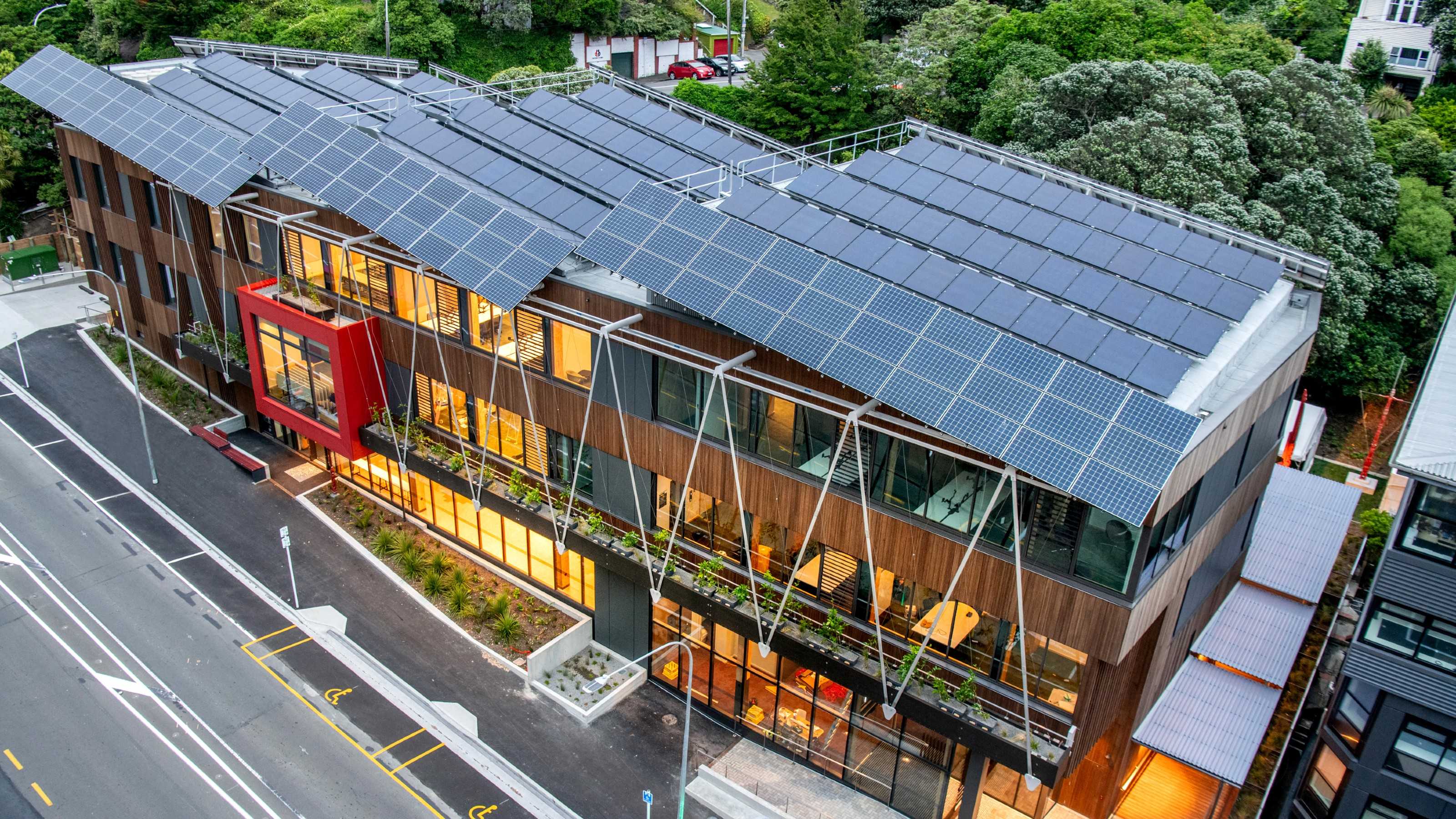 An aerial view of the Ngā Mokopuna building with solar panels.