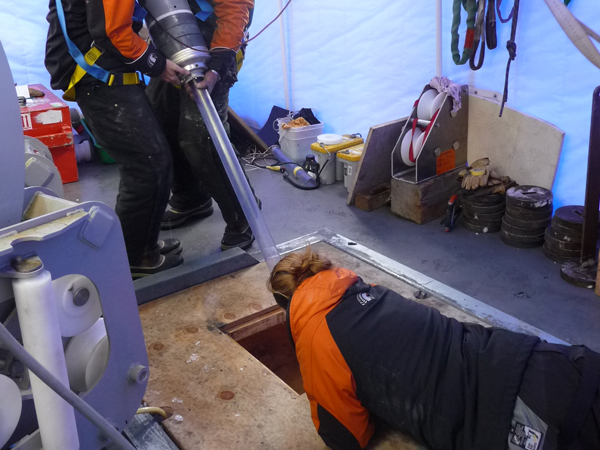 Richard Levy and Jeremy Ridgen recovering gravity corer, with Sanne Maas capping off the core c. Tamsin Falconer 2010-2011