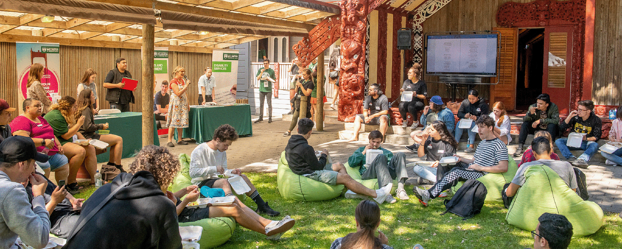 Students and staff outside the marae during orientation.