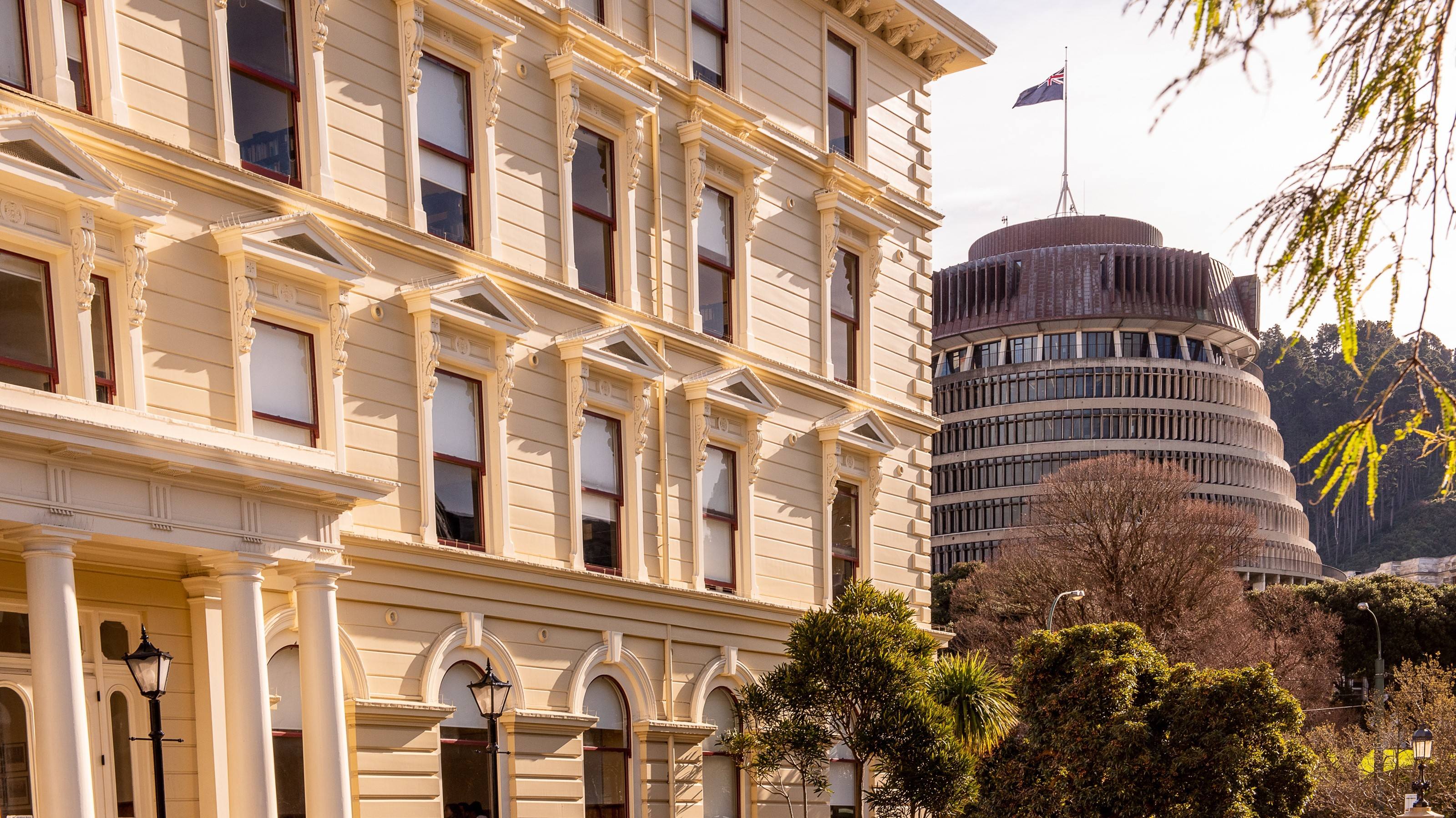 Outside of the Law school with the Wellington Beehive building in the background.