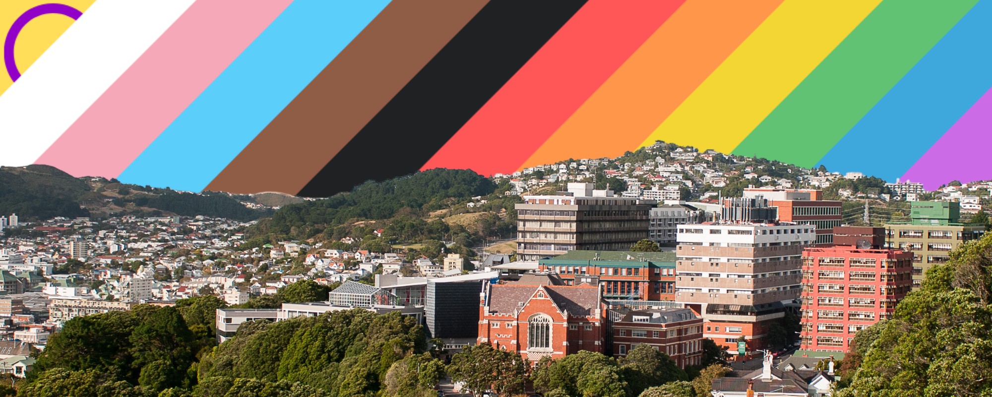 A rainbow sky behind the University's buildings
