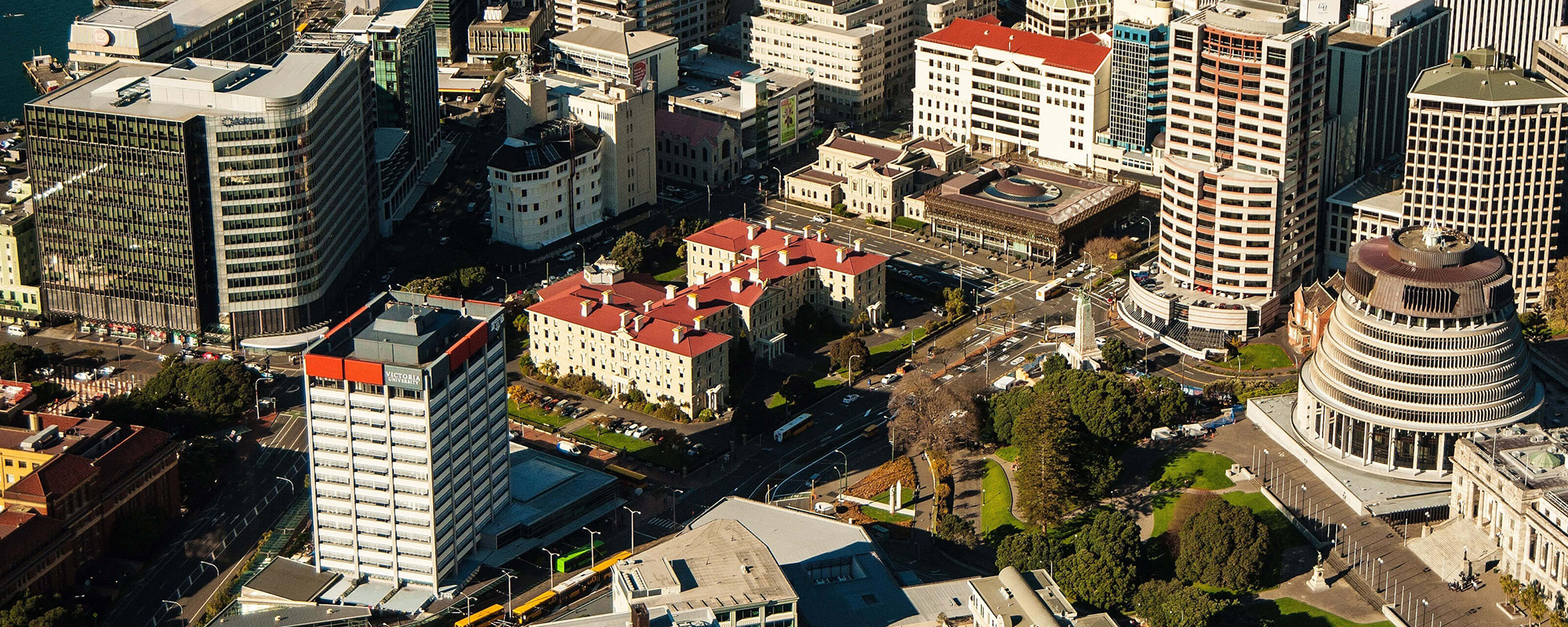 An aerial view over Wellington's central business district including the Beehive.