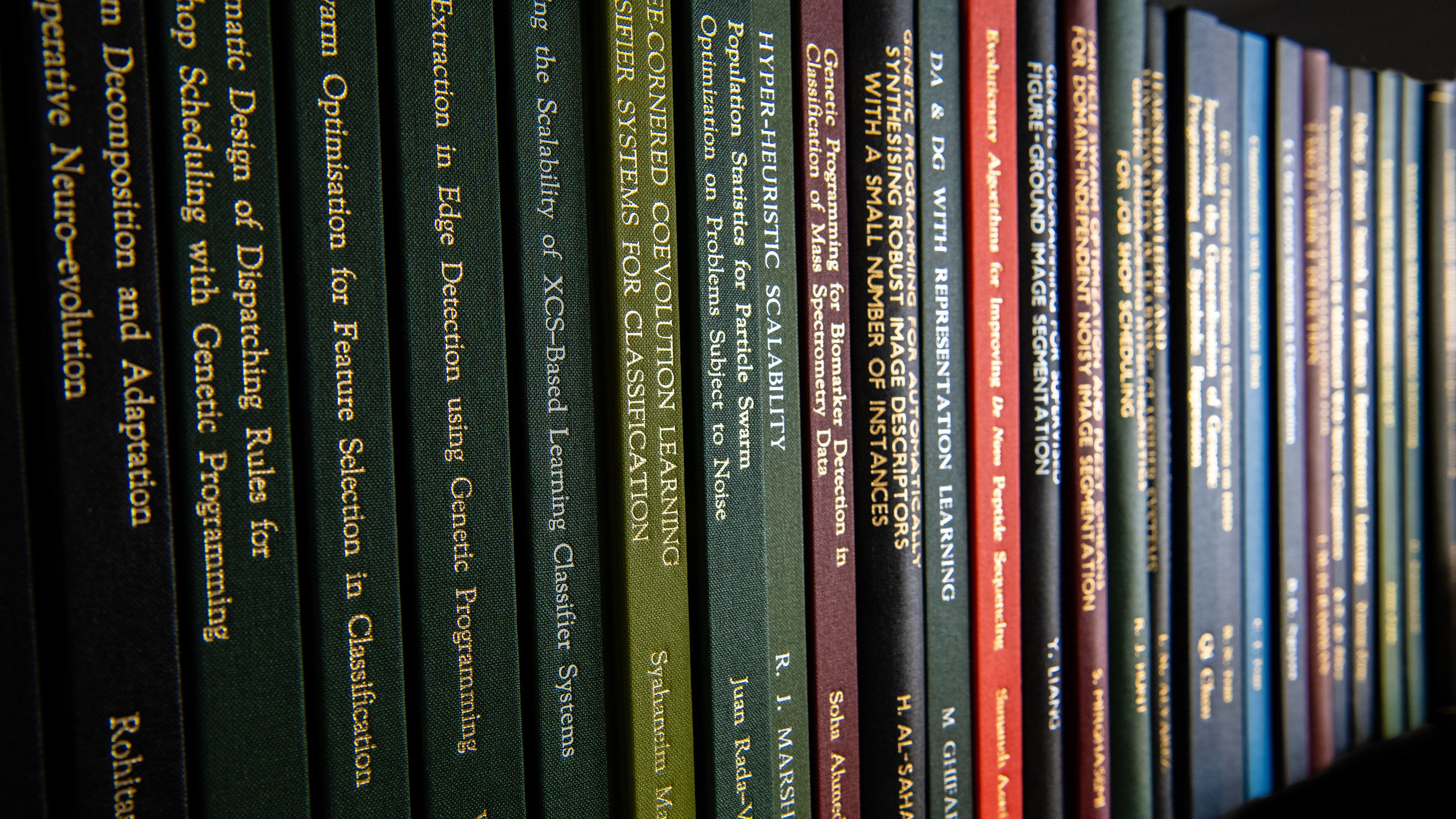 A row of spines of book publications