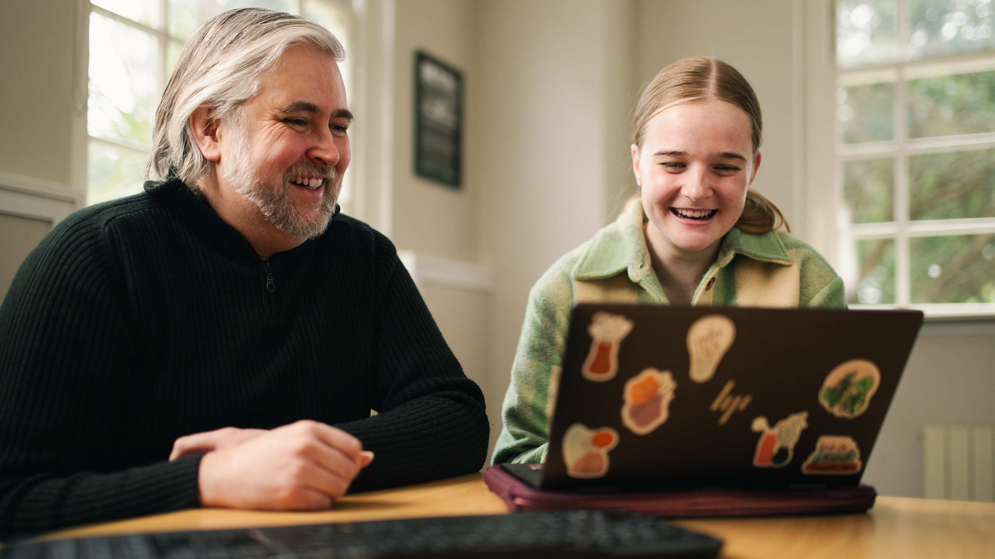 A Disability Services staff member showing a student some online tools