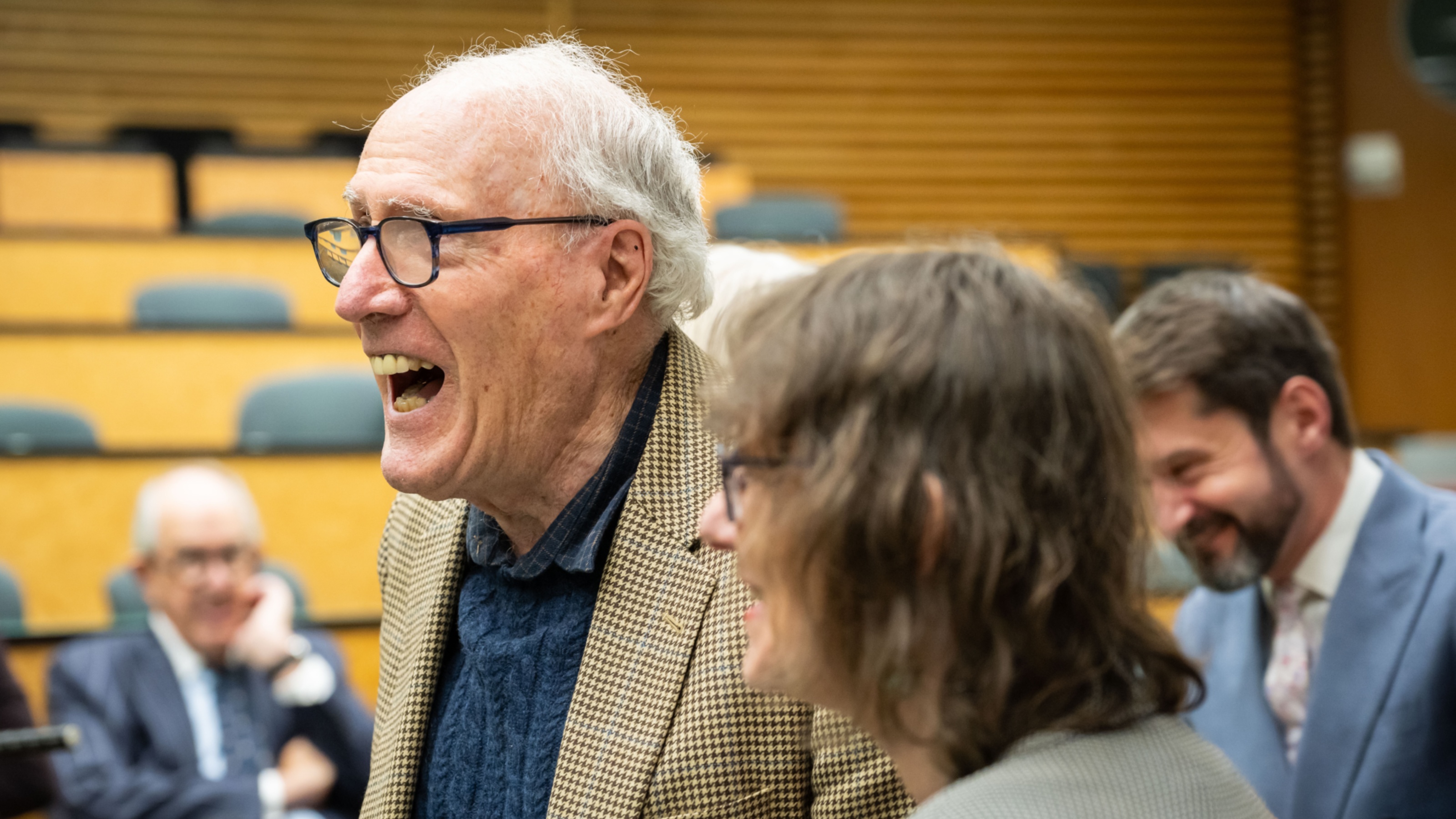 man and woman laughing