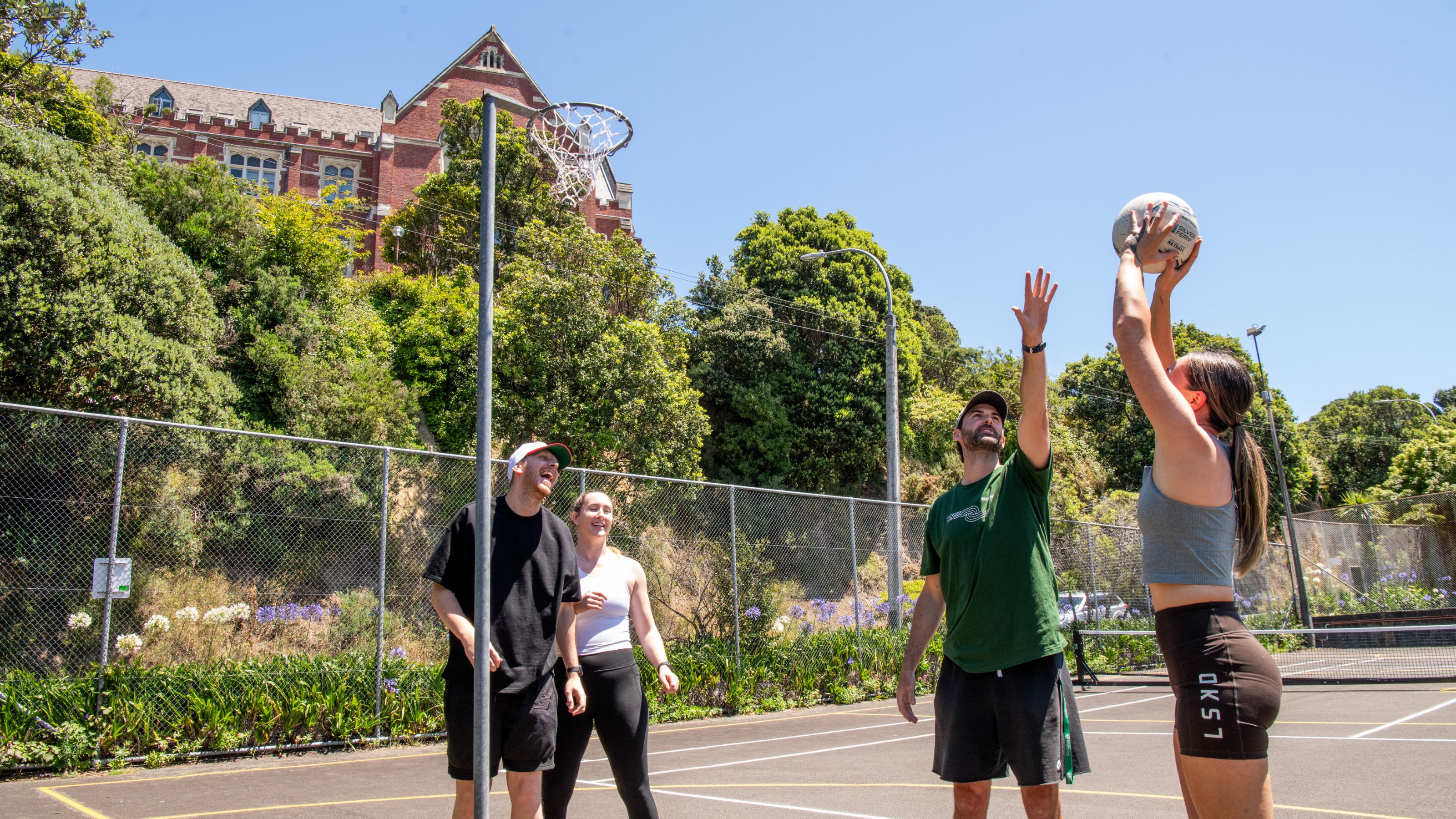 A group of young people playing Netball at the Salamanca courts