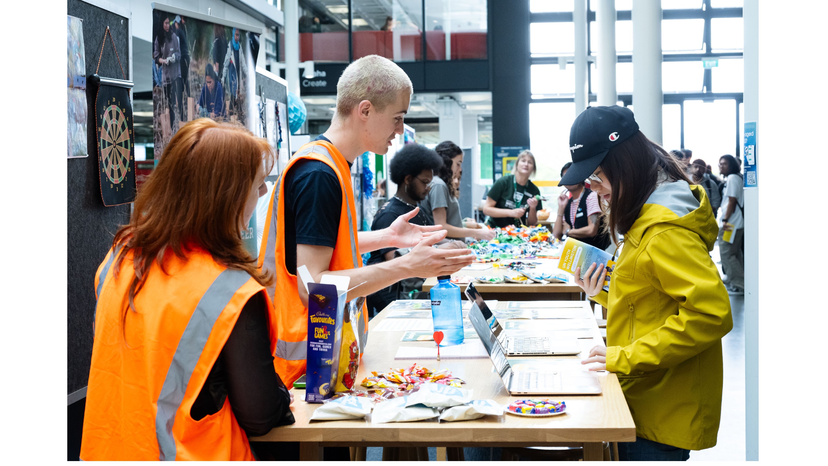 Members of the SVA talk to a visitor to their expo stand, promoting the club.