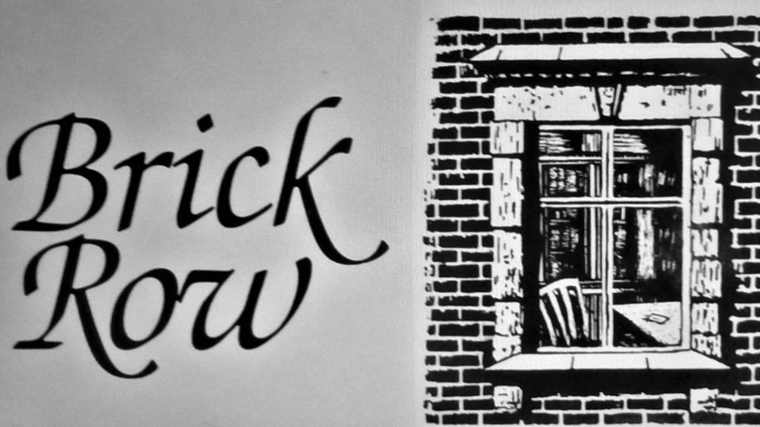 Brick Row logo window and desk